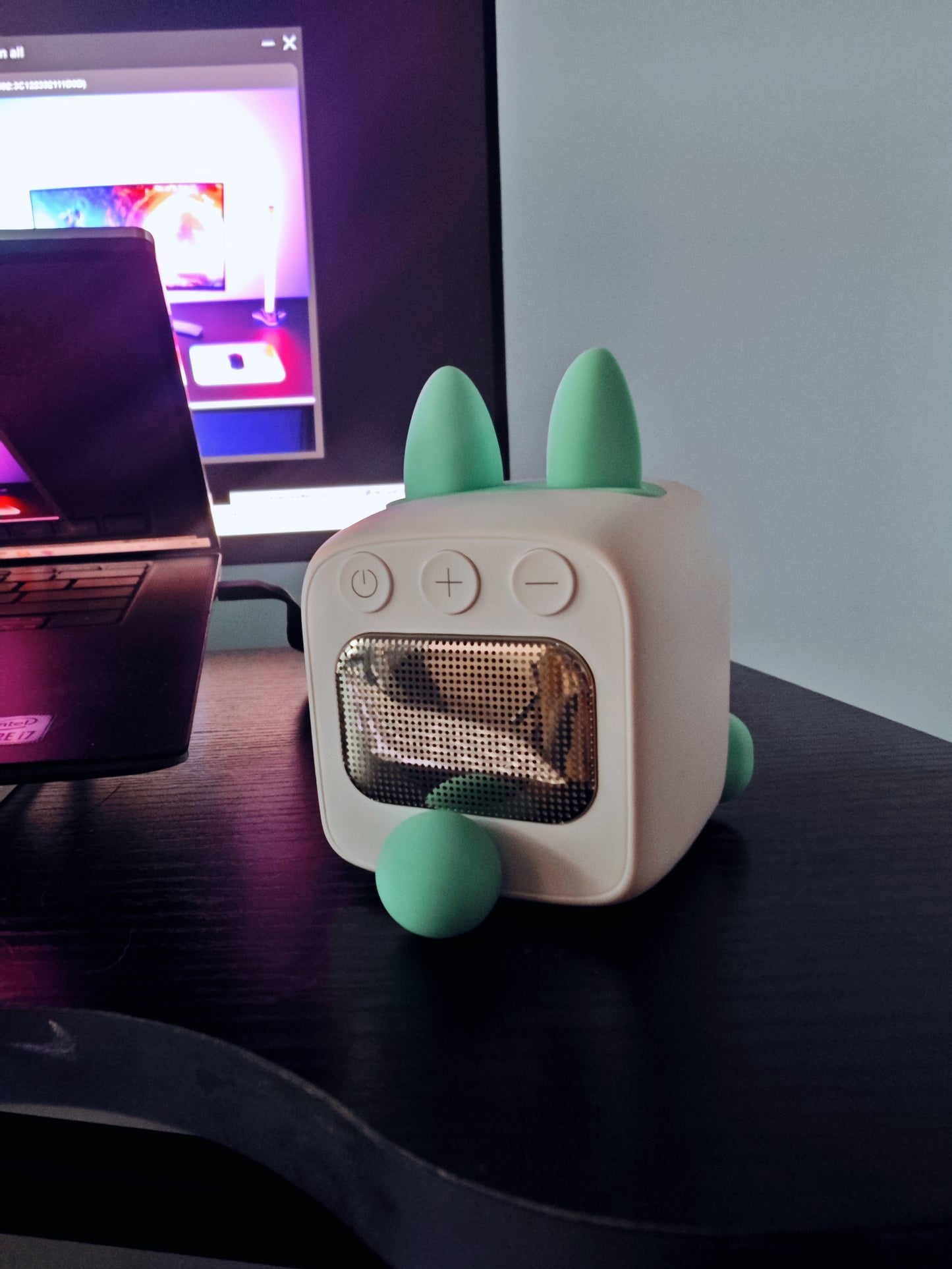 MILI Robot Pet close-up showing smart display and Bluetooth speaker features
